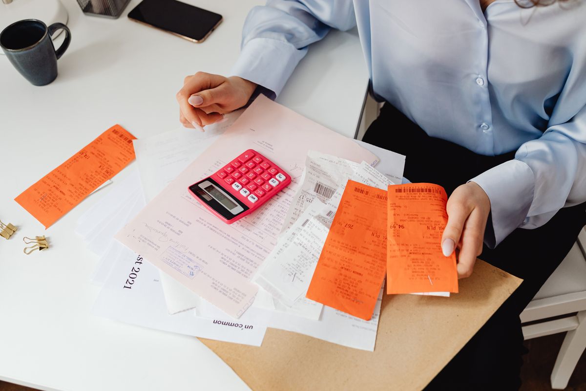 Receipts and calculator on a desk